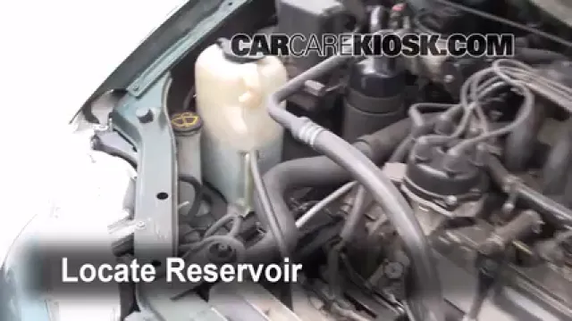 1999 Nissan Quest GXE 3.3L V6 Líquido limpiaparabrisas Agregar líquido